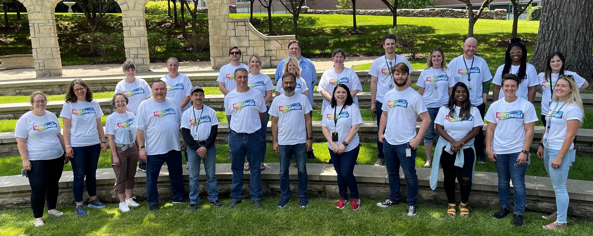 MRIGlobal Staff standing outside with Pride Shirts on